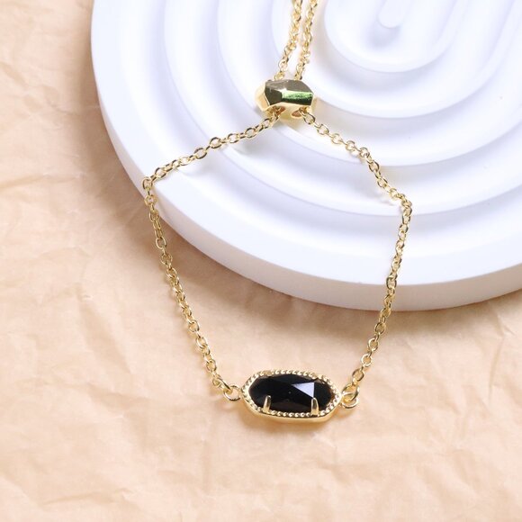 Kendra Scott - Elaina Black Opaque Glass Adjustable Chain Bracelet Gold - Picture 1 of 2